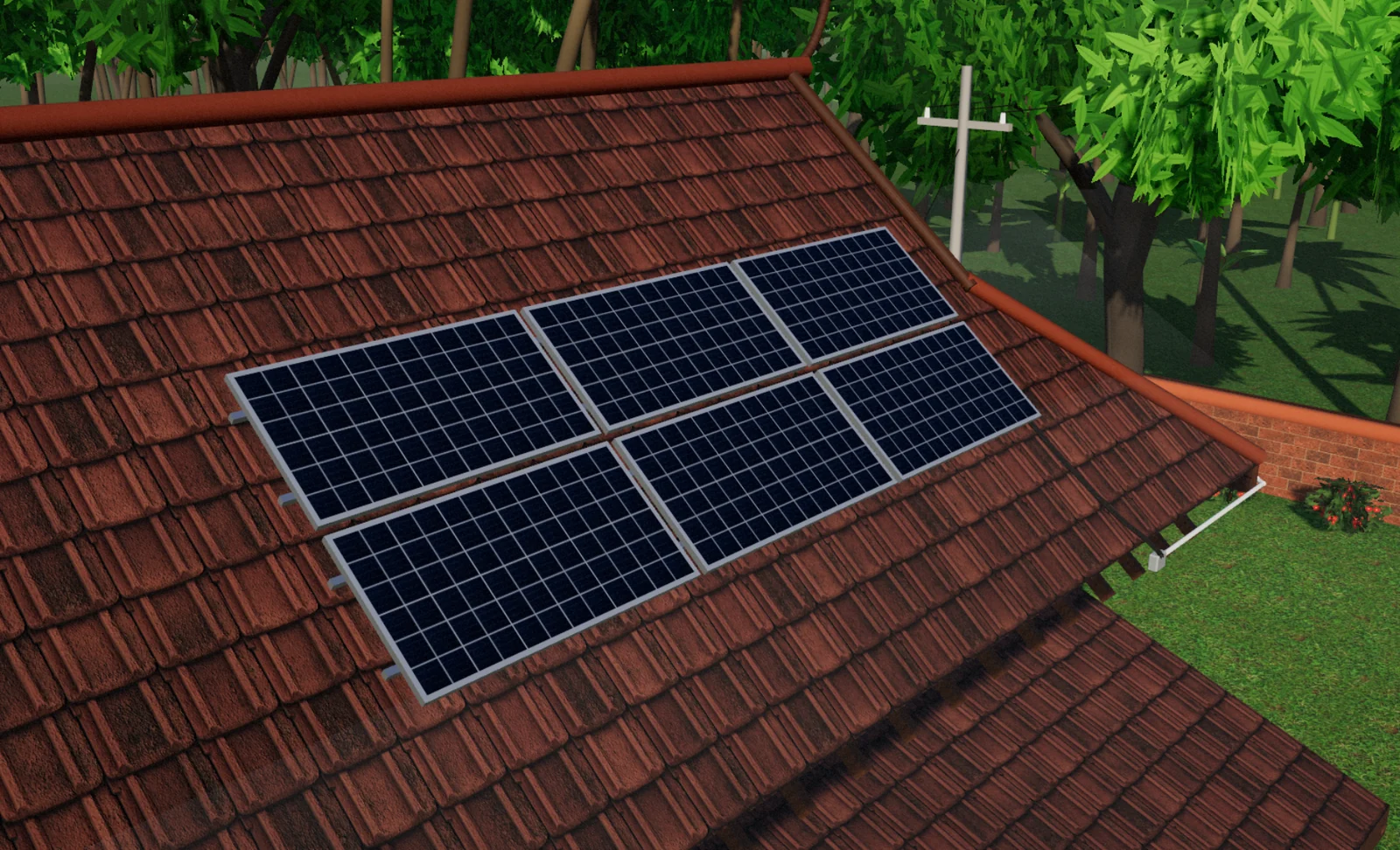 Close up of rooftop solar panels on the terracotta tiled roof of a Kerala tharavadu, the garden below